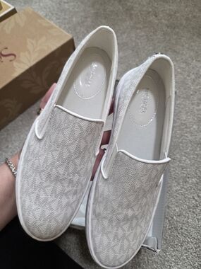 Michael Kors Women's Ivory Keaton Slip-On Sneakers with Signature Logo